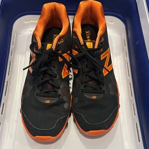 New Balance Minimus Ionix 3090 running shoes in black and orange. Size 13
